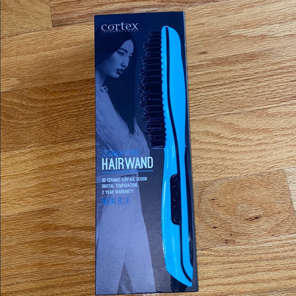 Straightening heated hair brush by cortex